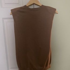 LouLou Studio wool sleeveless sweater with shoulder pads.